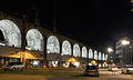 Illuminated arches of the Aussersihl Viadukt with shops (Im Viadukt)