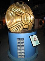 The Toledo Harbor Lighthouse's original Fresnel lens on display.