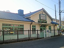 The old Ilsan Station Building, built in 1933 has a cross-shaped gable roof, with the gable showing in the front, and the sides of the building forming straight planes on either side. The gable area visible from the front is relatively wide but low in height, compared to other stations on the Gyeongui Line. The structure is made of wood, and the exterior walls are finished with wire mesh mortar.