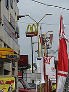 A row of A Mild advertisements (lower right) near Samarinda Central Plaza, Samarinda, East Kalimantan