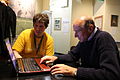 Harry Mitchell (left), teaching people how to edit Wikipedia