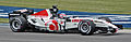 Takuma Sato driving the BAR 007 with "Racing Revolution" logo at the 2005 United States Grand Prix.