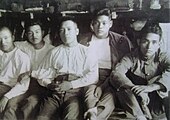 Tsuburaya (far right) sits with Imperial Japanese Army pals in the 1920s