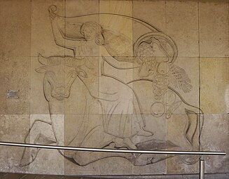 Modernist relief of Europe, forcing the wild bull on its knees and pouring out the cornucopia with the blessings of prosperity, in the Saarlouis Town Hall, Germany, by Nikolaus Simon, 1953-1955