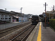 A SKR400 series train approaching Shigaraki Station