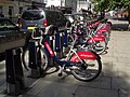 Image 39"Boris Bikes" from the Santander Cycles hire scheme waiting for use at a docking station in Victoria.