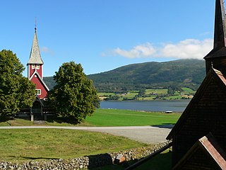 Exterior with view of Rødven Church in the background