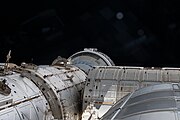Starliner docked to the ISS as seen from the Cupola