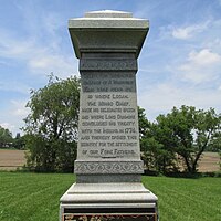 Boggs monument. Inscription reads "Under the spreading branches of a magnificent elm tree near by is where Logan the Mingo chief made his celebrated speech and where Lord Dunmore concluded his treaty with the Indians in 1774 and thereby opened this country for the settlement of our fore fathers."