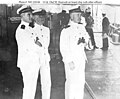 Husvtedt (right) as a lieutenant commander aboard ship with two other officers, ca. 1921-1924