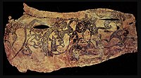 Tattoos of the chief's right arm, with zoomorphic symbols.[38]