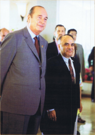 Ryuko Hira with President Jacques Chirac of France during the G8 Summit of 2000 in Rizzan Sea-Park Hotel