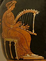 Art from Greek vase: a woman plays a psalterion harp