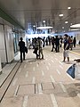 The new north-south corridor of Shin-Koiwa Station on the Sobu Line in Tokyo, opened on June 24, 2018 allows people to walk from the north entrance to the south entrance without walking around the station building. This view is towards the north exit.