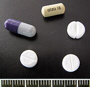 Clockwise from top: Concerta 18 mg, Medikinet 5 mg, Methylphenidat TAD 10 mg, Ritalin 10 mg, Medikinet XL 30 mg.