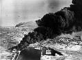 Image 56Smoke rises from oil tanks beside the Suez Canal hit during the initial Anglo-French assault on Egypt, 5 November 1956. (from Egypt)