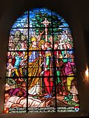 Stained glass inside the Église Saint-Ouen in Le Tronquay