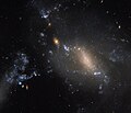 NGC 3447 comprises a couple of interacting galaxies.[12]