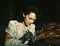 Image 14During World War II, a female aircraft worker checks electrical assemblies at the Vega Aircraft Corporation in Burbank, California.