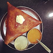 Butter dosa, known as benne dose in Kannada.