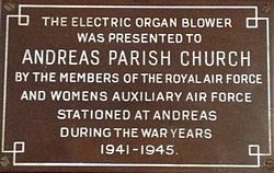 Plaque commemorating the donation of the organ to St Andrew's Church by personnel from RAF Andreas
