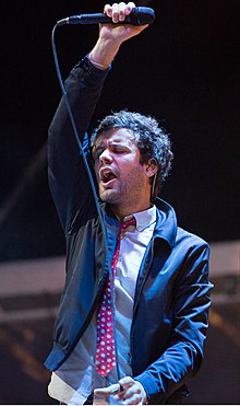 Angelakos performing with Passion Pit at Lipton's Be More Tea Festival at Riverfront Park in North Charleston, South Carolina, in 2015