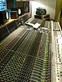 Image 17Neve VR60, a multitrack mixing console. Above the console are a range of studio monitor speakers. (from Recording studio)