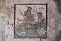 Erotic wall painting. West wall. Casa del Ristorante. Pompeii