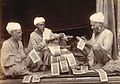 Three Hindu priests writing religious texts. 1890s, Jammu and Kashmir, photographer: unknown.