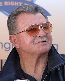 Mike Ditka, wearing sunglasses, from the shoulders up.