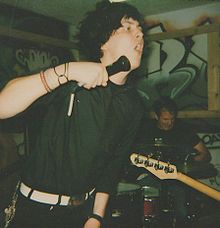 Jayson Green (front) and Jeffrey Salane (back) performing in Bloomington, Indiana in 2000.