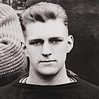 Carpenter cropped from team picture, sitting