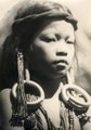 A Punan girl, some Dayak tribes are known for their elongated earlobes formed by iron earrings (1931-1932)