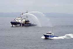 Russian Coast Guard Project 745P border patrol ship Bug and Type Yamaha border patrol boat Steregushchy during the Russian-Japanese exercise in Aniva Bay in 2009