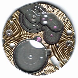 Barley guilloche pattern on a watch movement main plate