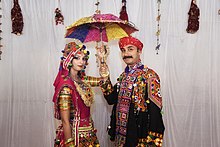 Garba dressing: traditional dressing male is kediyu while the traditional female dress is chaniya choli.
