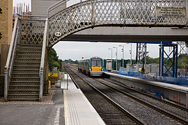 IÉ 22000 Class diesel multiple unit approaching Adamstown railway station, Dublin, Ireland