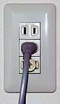 Japanese socket with grounding post, for a washing machine