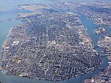 An aerial photo of Alameda Island from the southeast looking along its length to the northwest.