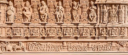 Exterior wall carvings depicting the Rath Yatra festival of Jagannath in Odisha