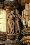 Apsara (right) exposes her yoni