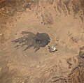 Satellite image of the Tousside volcano (large dark area in centre). Trou au Natron is visible below and to the right (smaller white area).