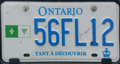 Personalized plate bearing the image of the Franco-Ontarian flag ("FL" code). The marketing legend reads "Tant à découvrir", in French.