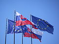 Slovak flag and European Union flag are often seen together front of government buildings