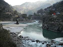The Alaknanda River flowing in from the left meets the Pindar River (center background) to flow on as the Alaknanda again (foreground) at Karnaprayag
