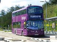 Level-boarding onto a double-decker bus on the Leigh-Salford-Manchester Bus Rapid Transit