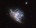 NGC 6052 observed by Hubble with its WFPC2 camera.[7]
