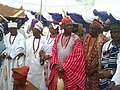 Kofoworola Oladoyinbo Ojomo, Ojomo Oluda of Ijebu, Owo (in red) in the company of some of his fellow chiefs