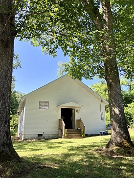 Small church, no regular services, open on a summer day.