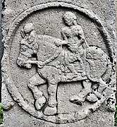 Foreigner on a horse. The medallions are dated circa 115 BC.[26]